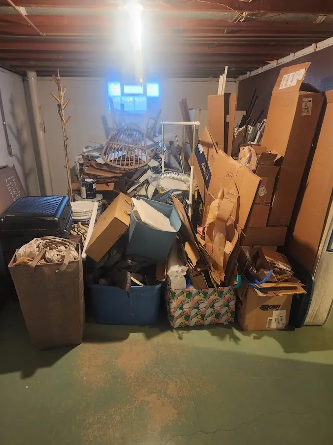 Roll-off dumpster container at job site for 4 Yard Dumpster Rental in Pontotoc